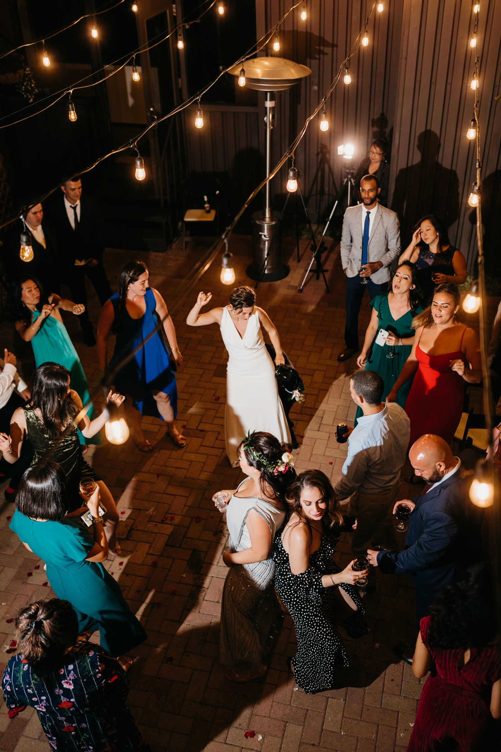 Top view of wedding guests dancing