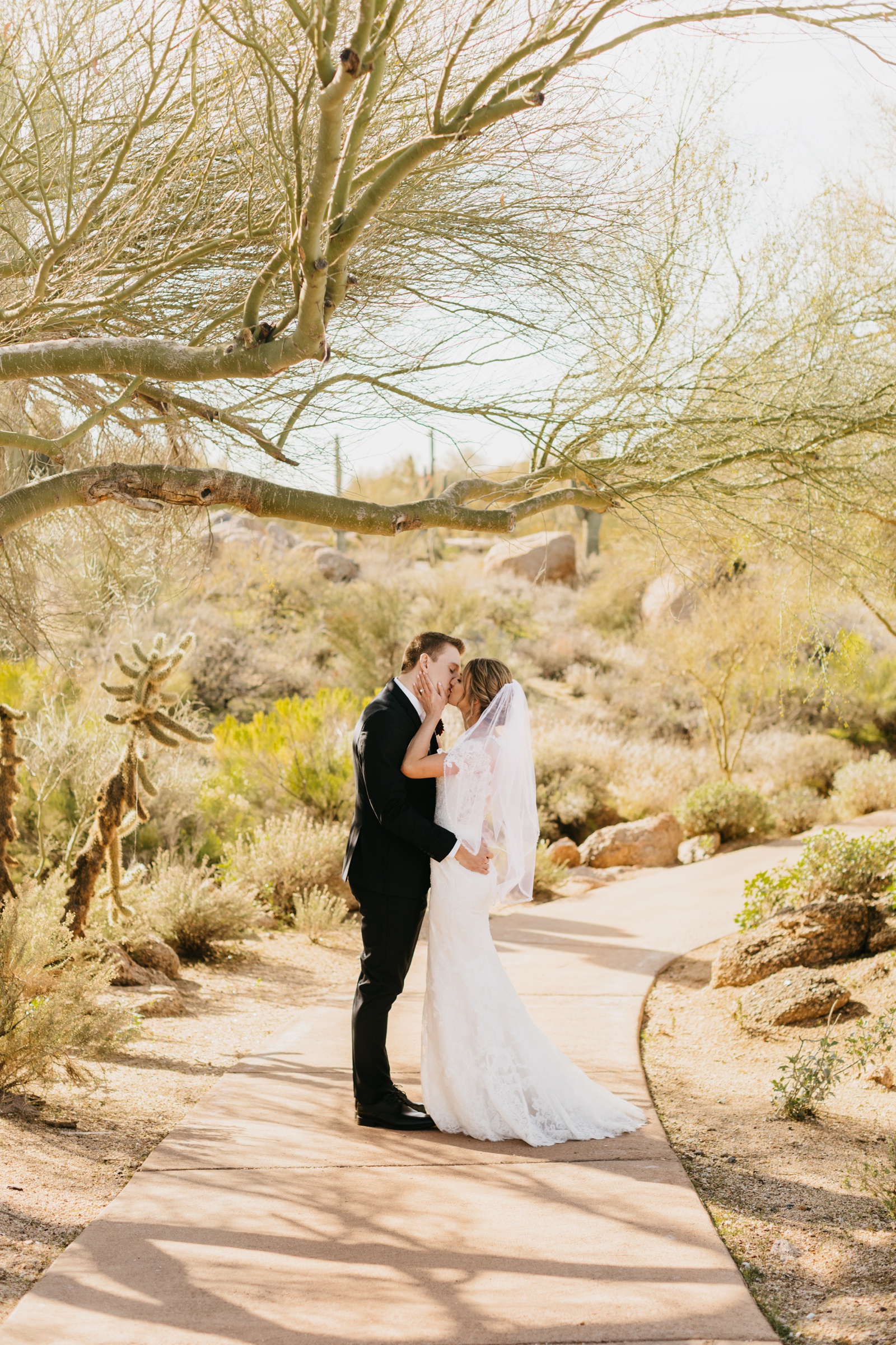 Bride and Groom Kissing at Scottsdale Arizona Wedding at Troon North Golf Club