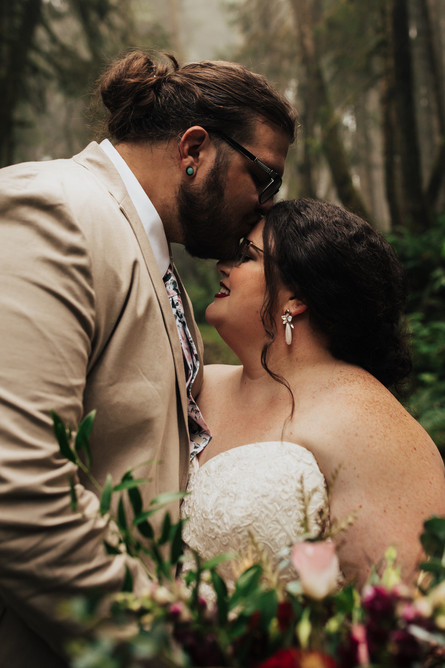 Groom kissing bride at Oregon Elopement at Ecola State Park