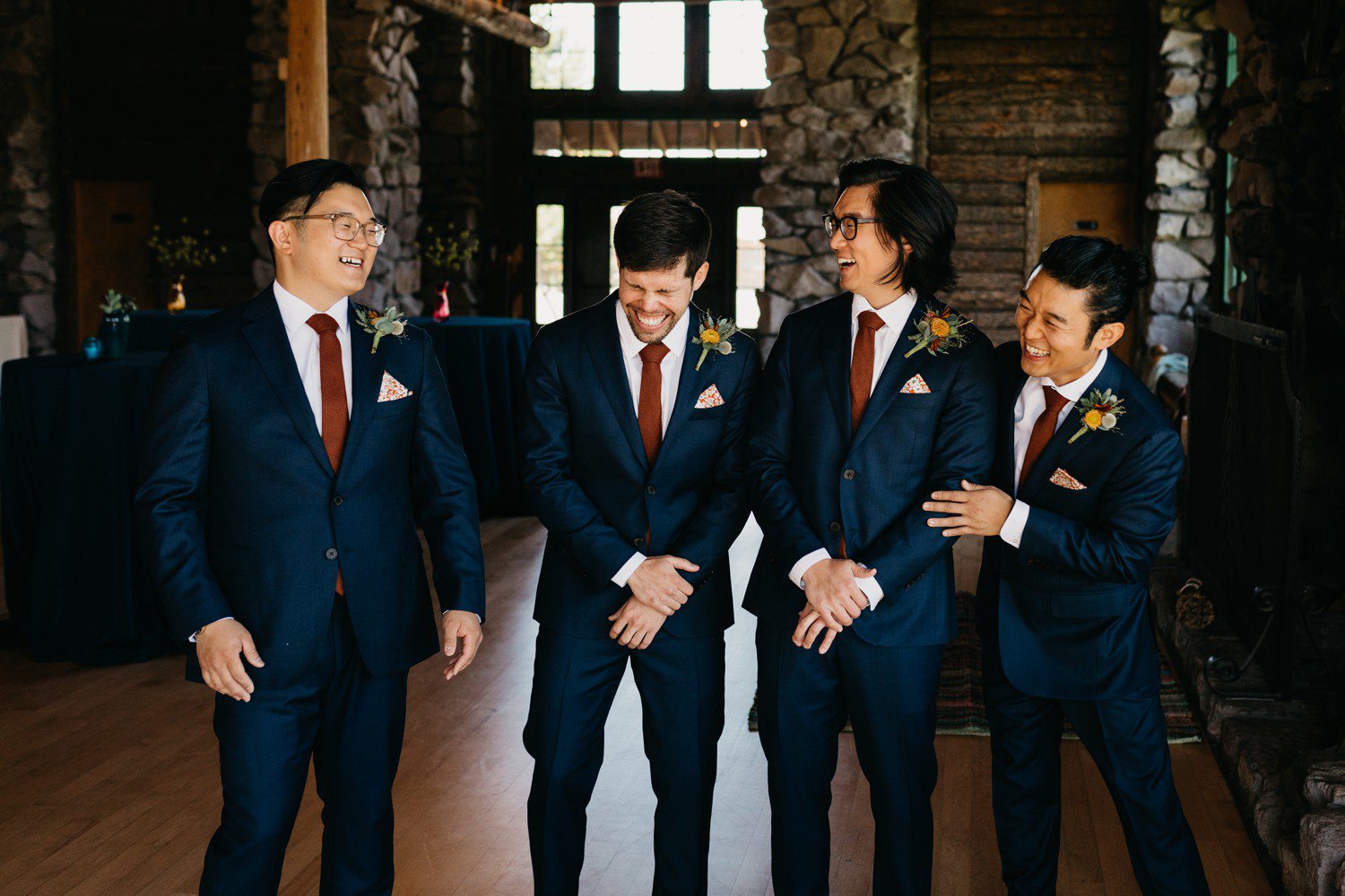 Groomsmen laughing at Union Pacific Dining Lodge