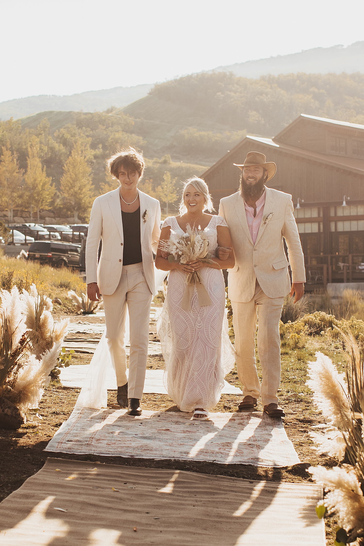 woman walks down outdoor aisle at High West in Park City, Utah