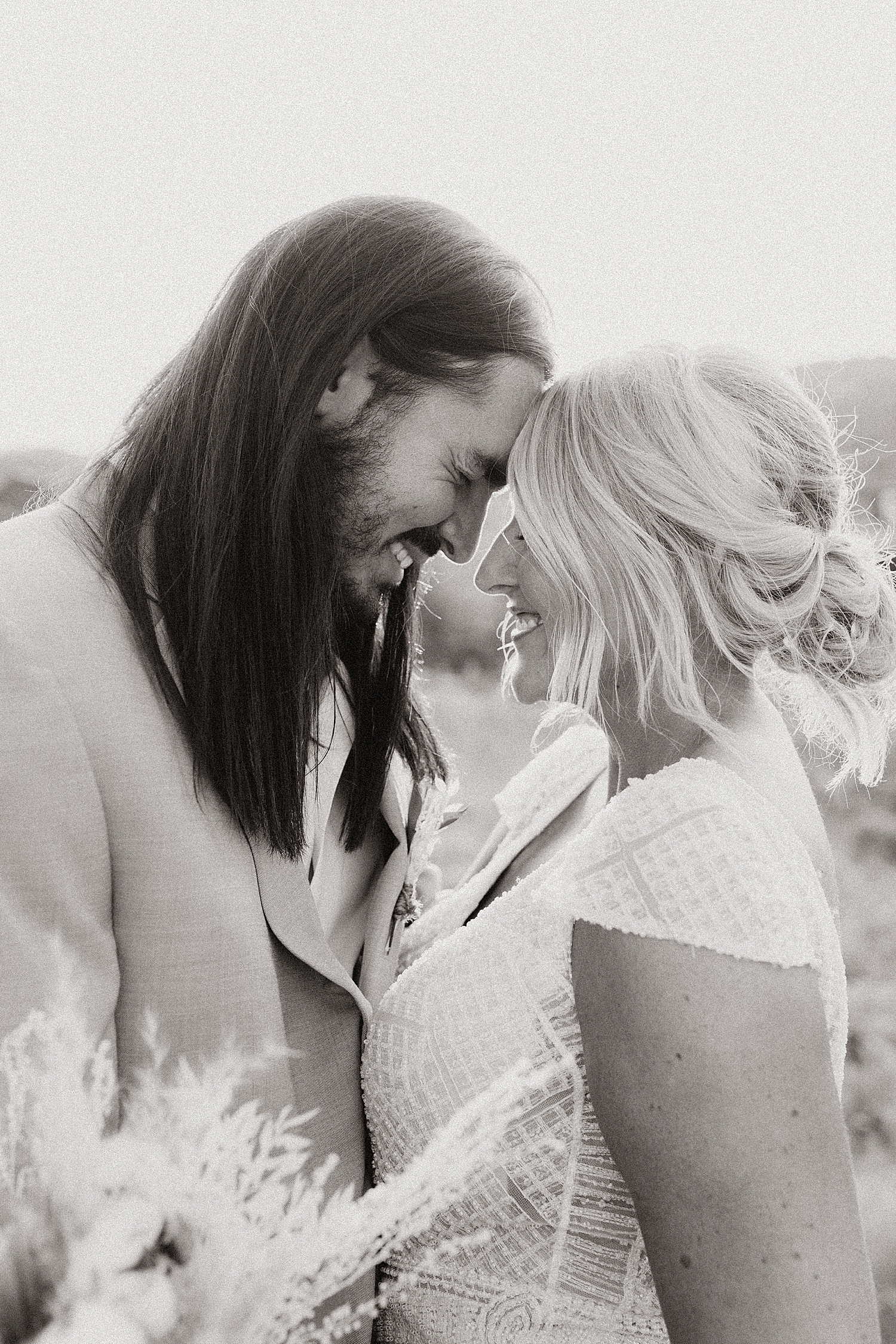 husband and wife share post-ceremony embrace at High West in Park City, Utah