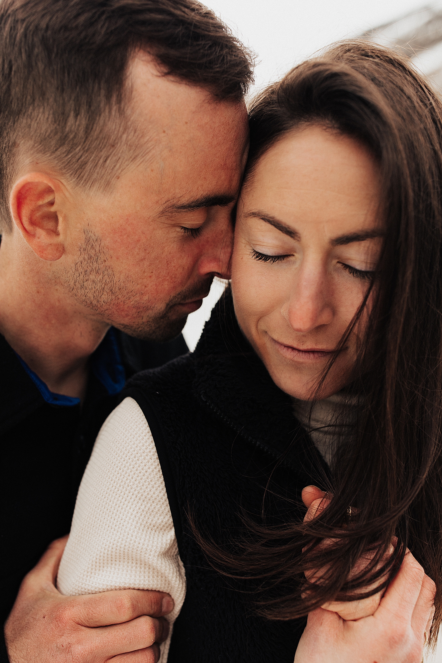 man leans in to snuggle fiance's temple by Nicole Easton Photo