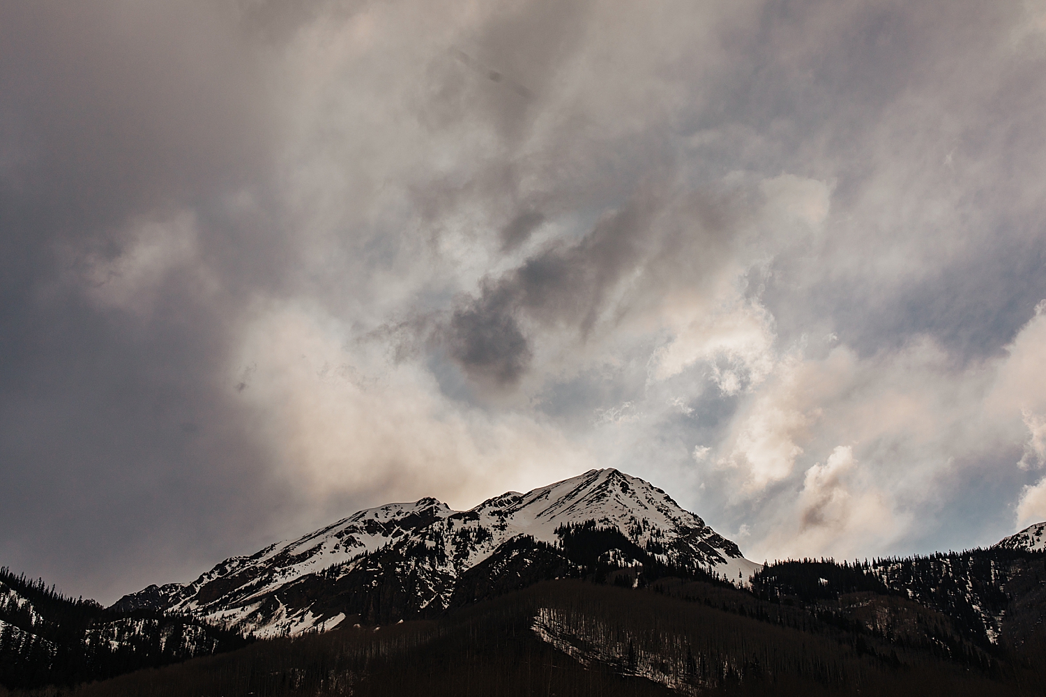 cloudy day over Colorado range by Nicole Easton Photo