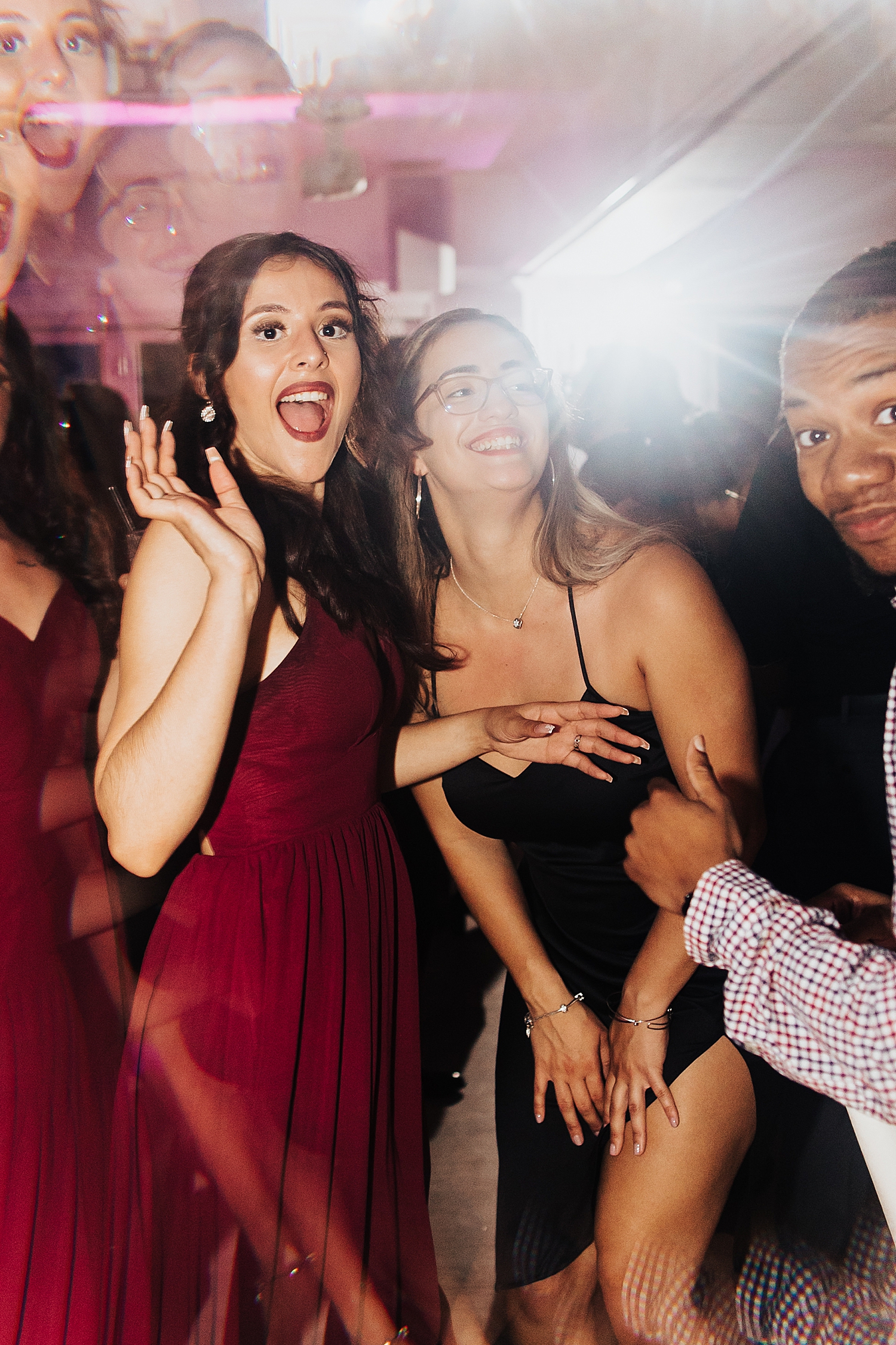 guests dance under star lights at reception by Nicole Aston Photo