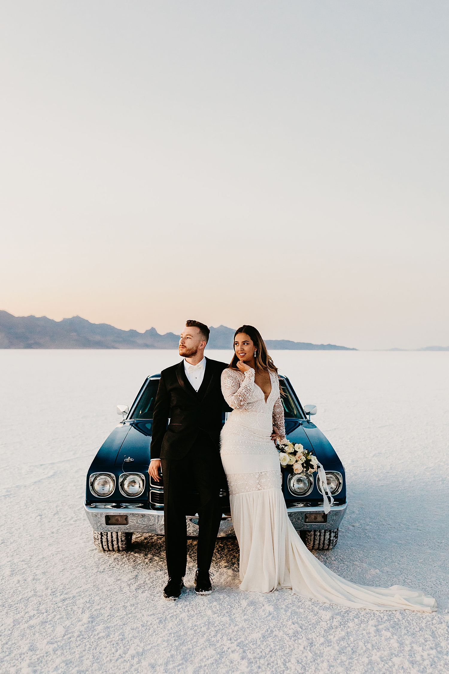 engaged couple lean on old sports car for First Look + Bridal Session