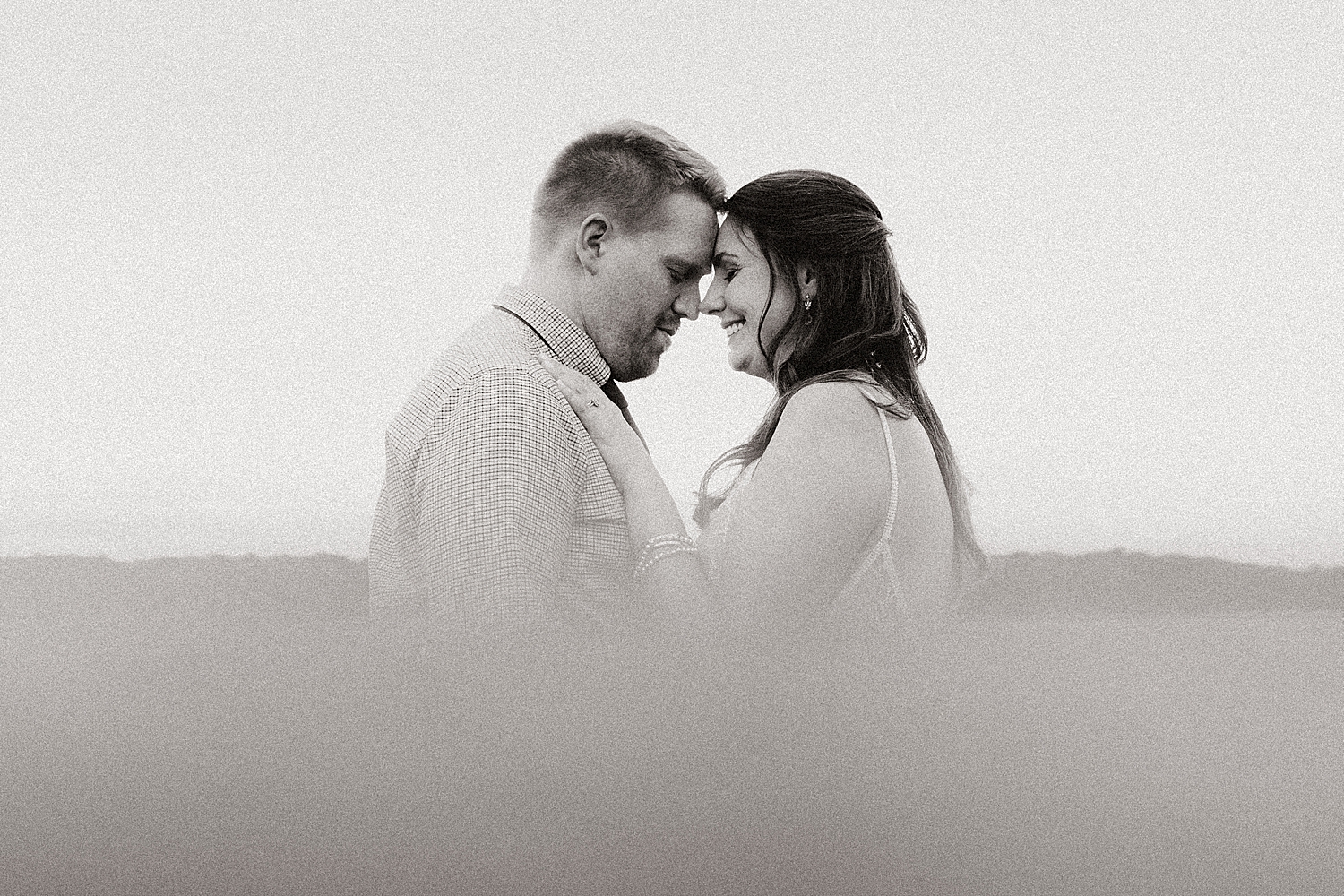 newlyweds hold each other close during big day at The Finger Lakes