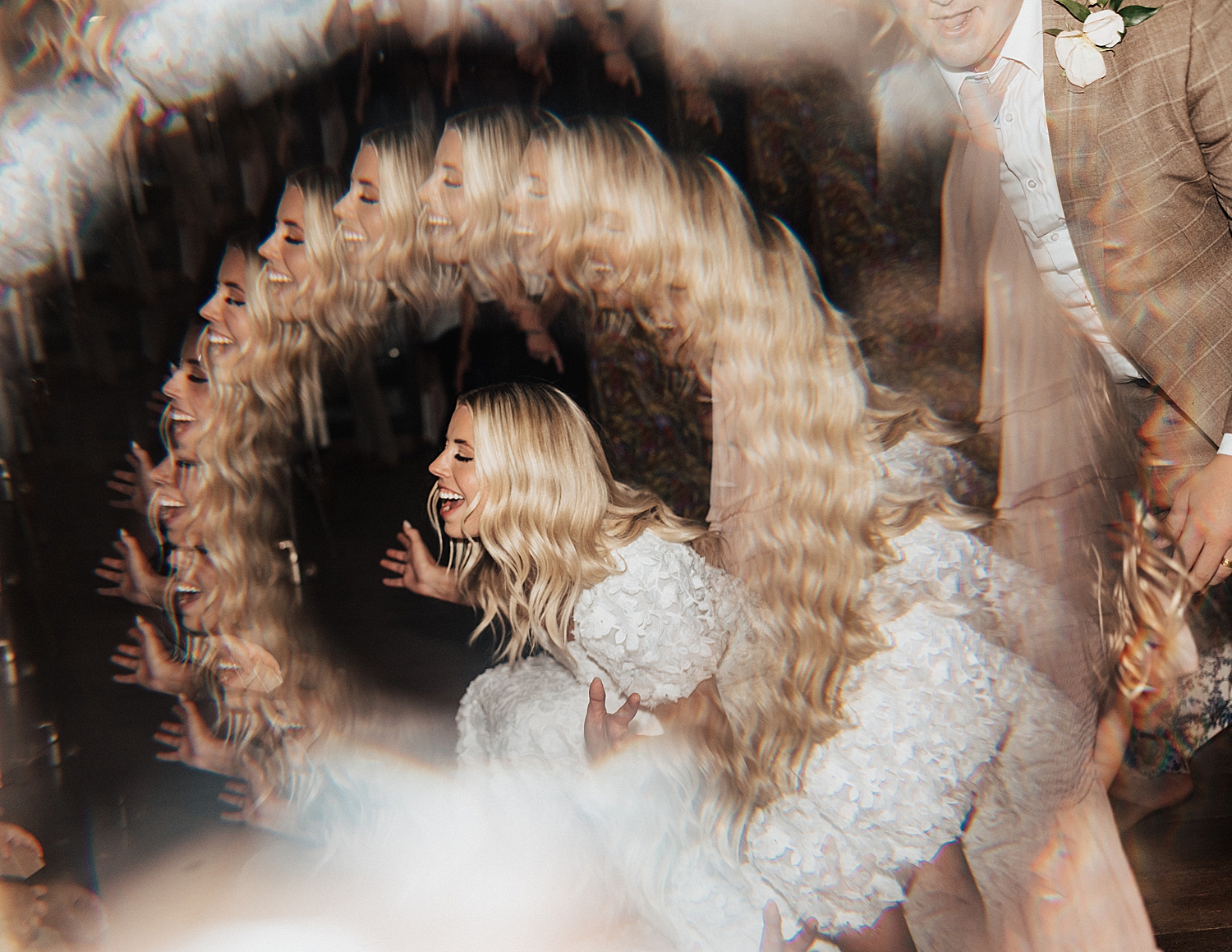 bride dancing in the evening at her reception by Destination wedding photographer