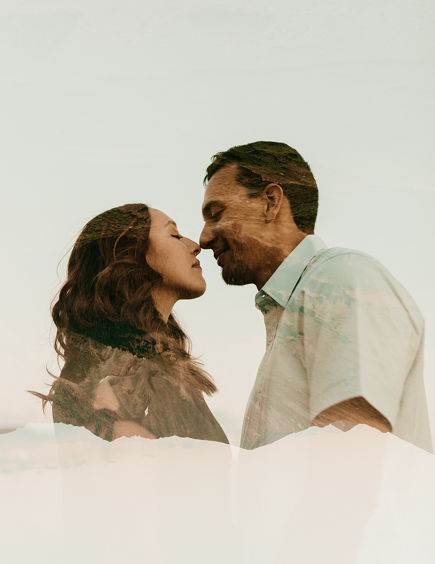 husband and wife-to-be lean in for kiss at Loveland Pass