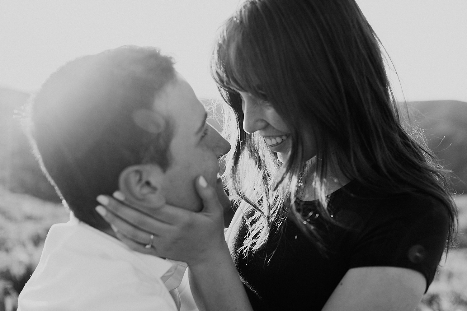 woman gazes lovingly at her husband-to-be by Nicole Aston Photography
