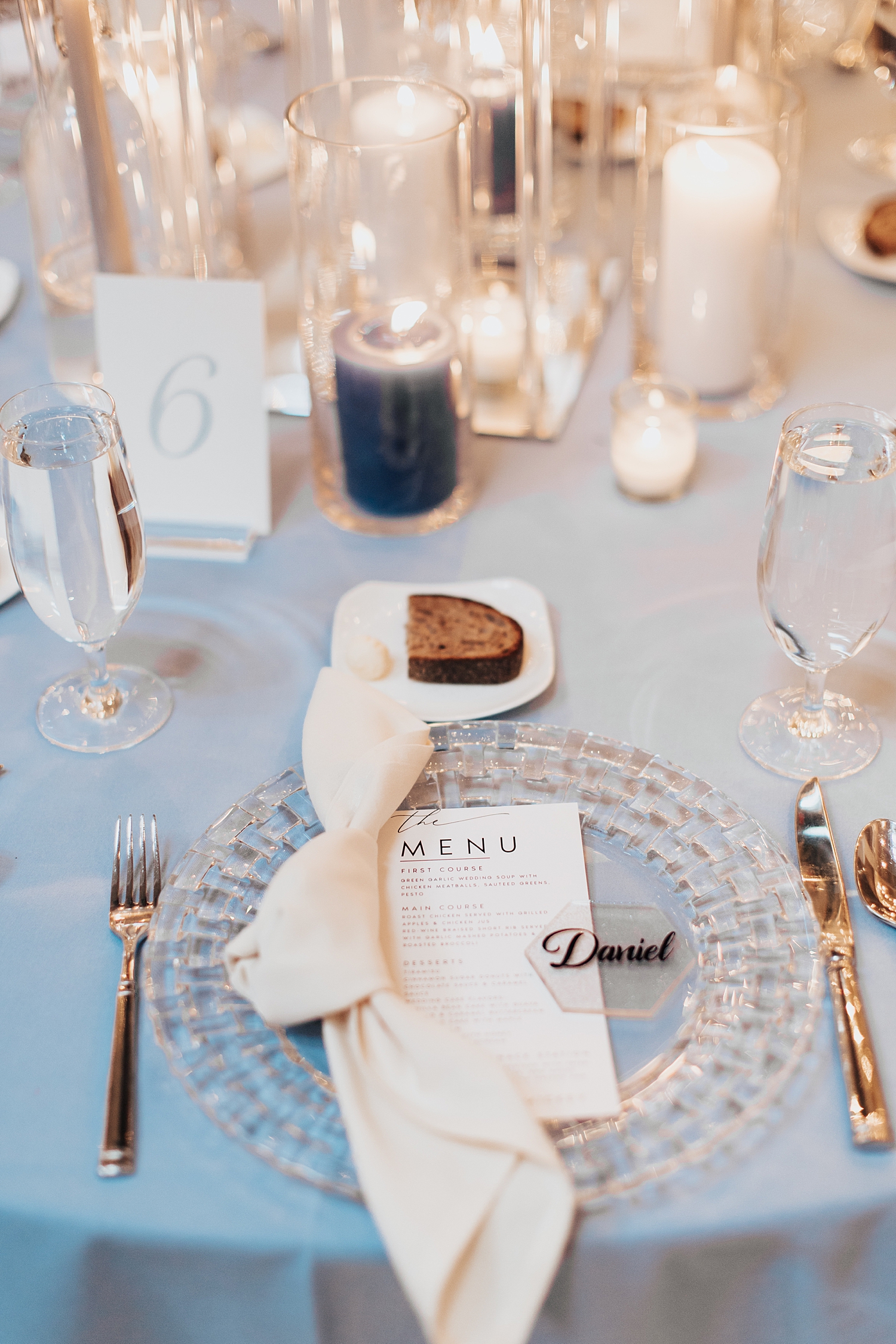 dinner setting with gold, crystal and blue accents by Nicole Aston photography