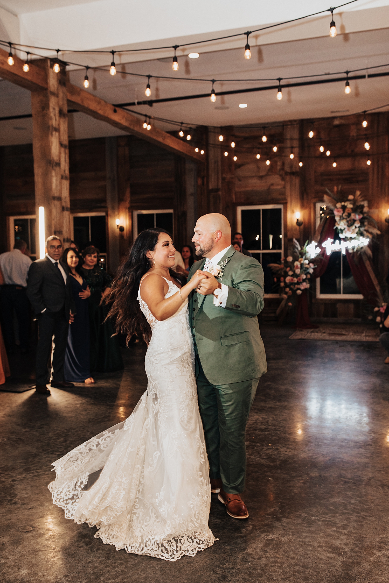newlyweds share a dance at reception for Iowa wedding weekend