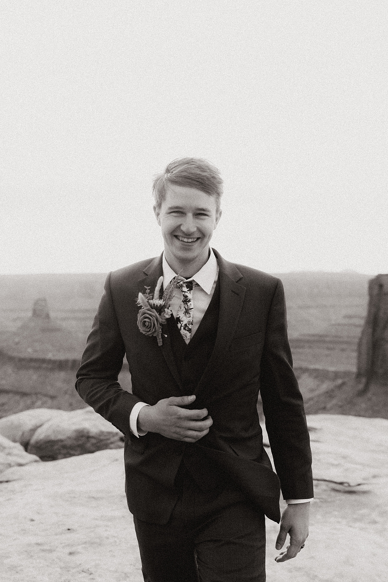 groom smiling because he just got married at Whispering Oaks Ranch