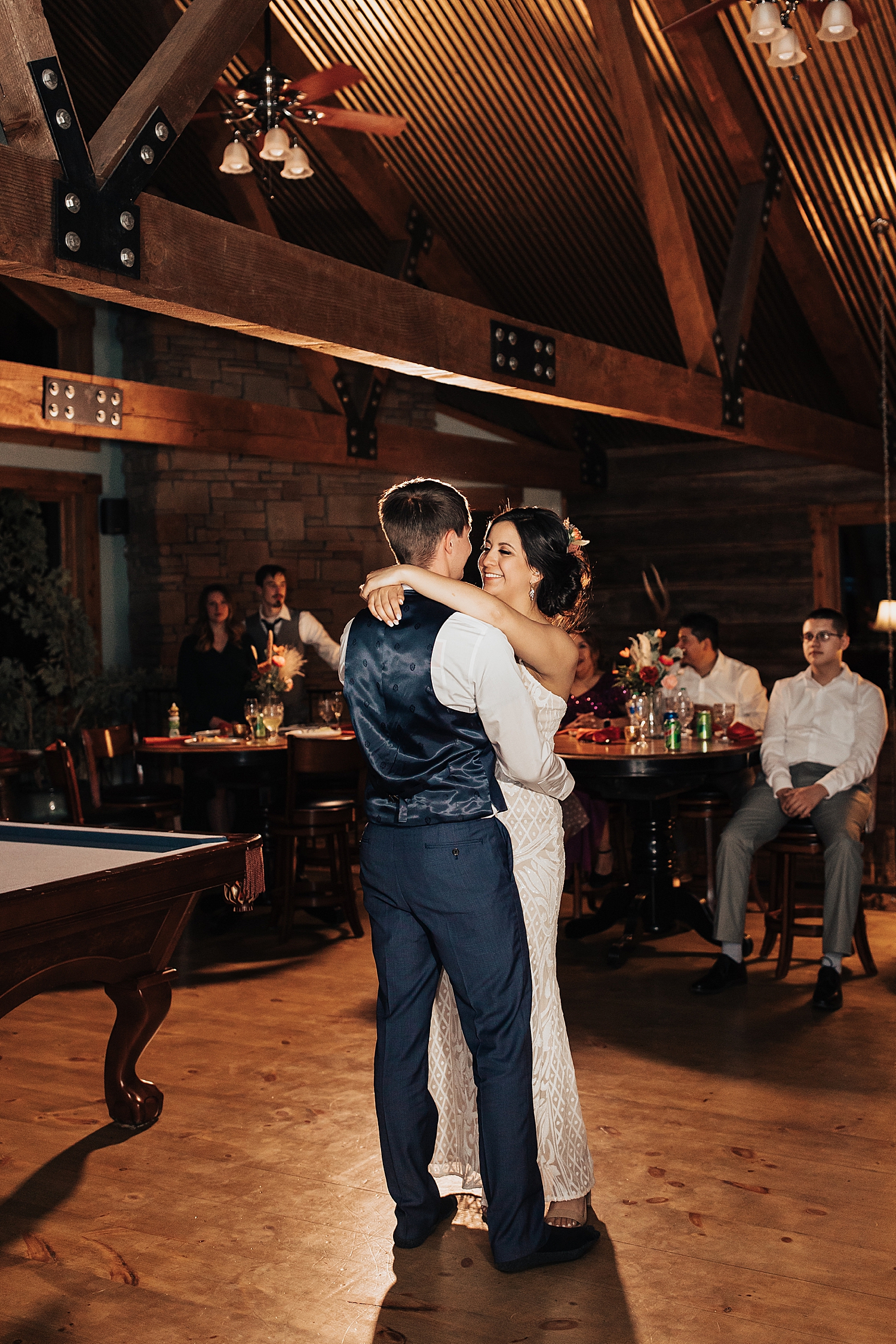 newly married couple share a first dance at Whispering Oaks Ranch