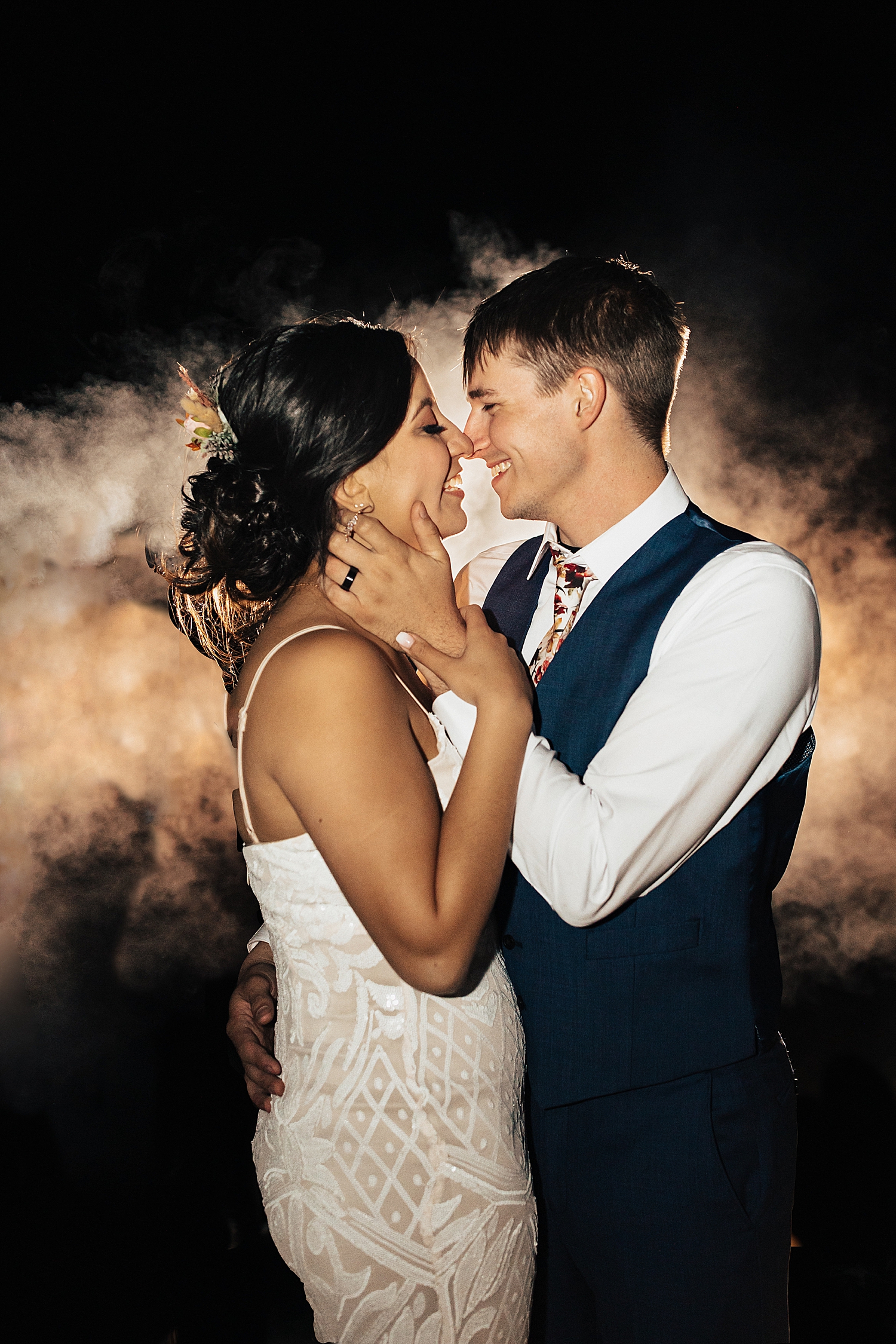 newly married couple dance in smoke by Destination wedding photographer