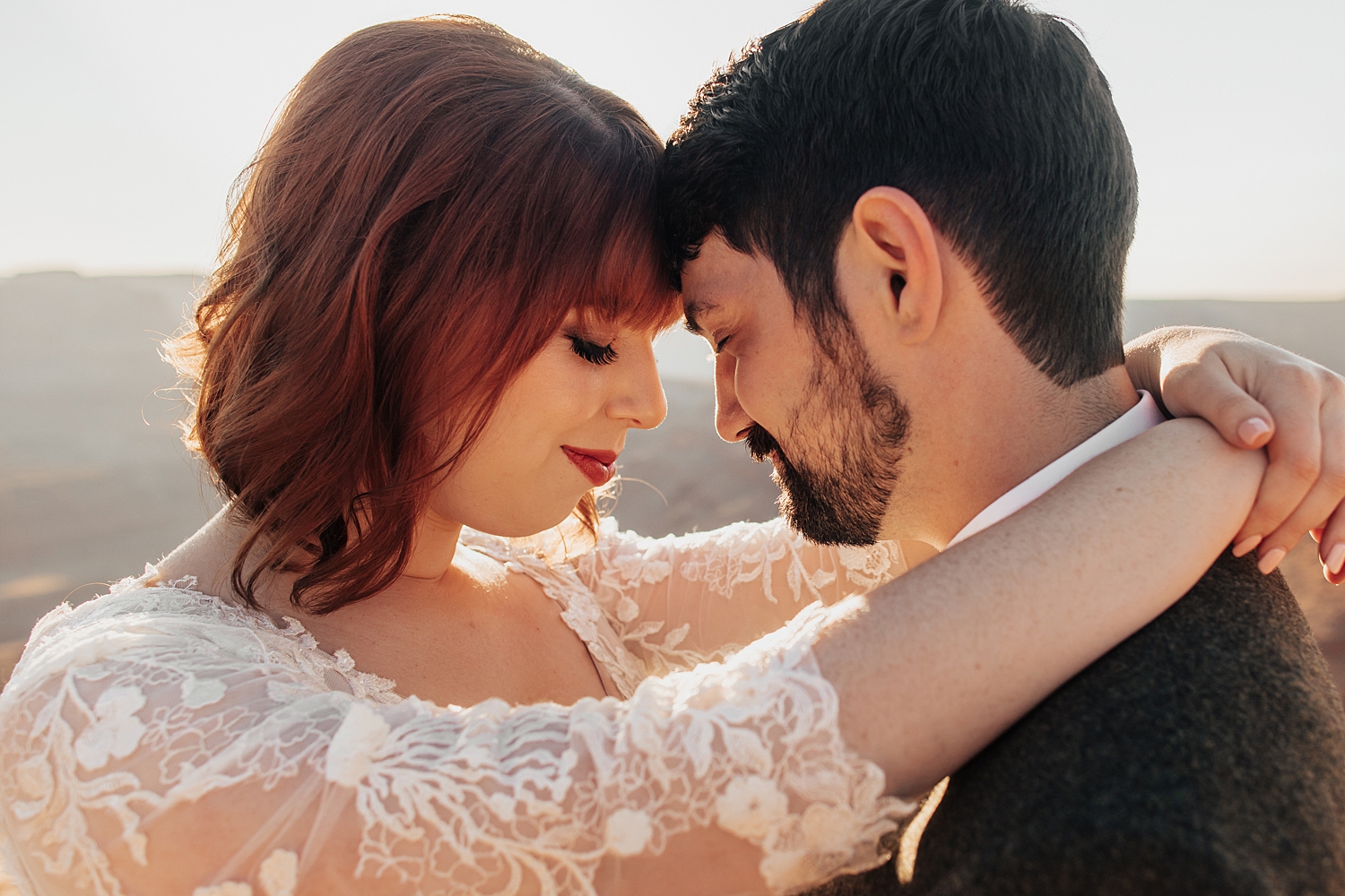 newlyweds put foreheads together lovinglyg by Destination wedding photographer