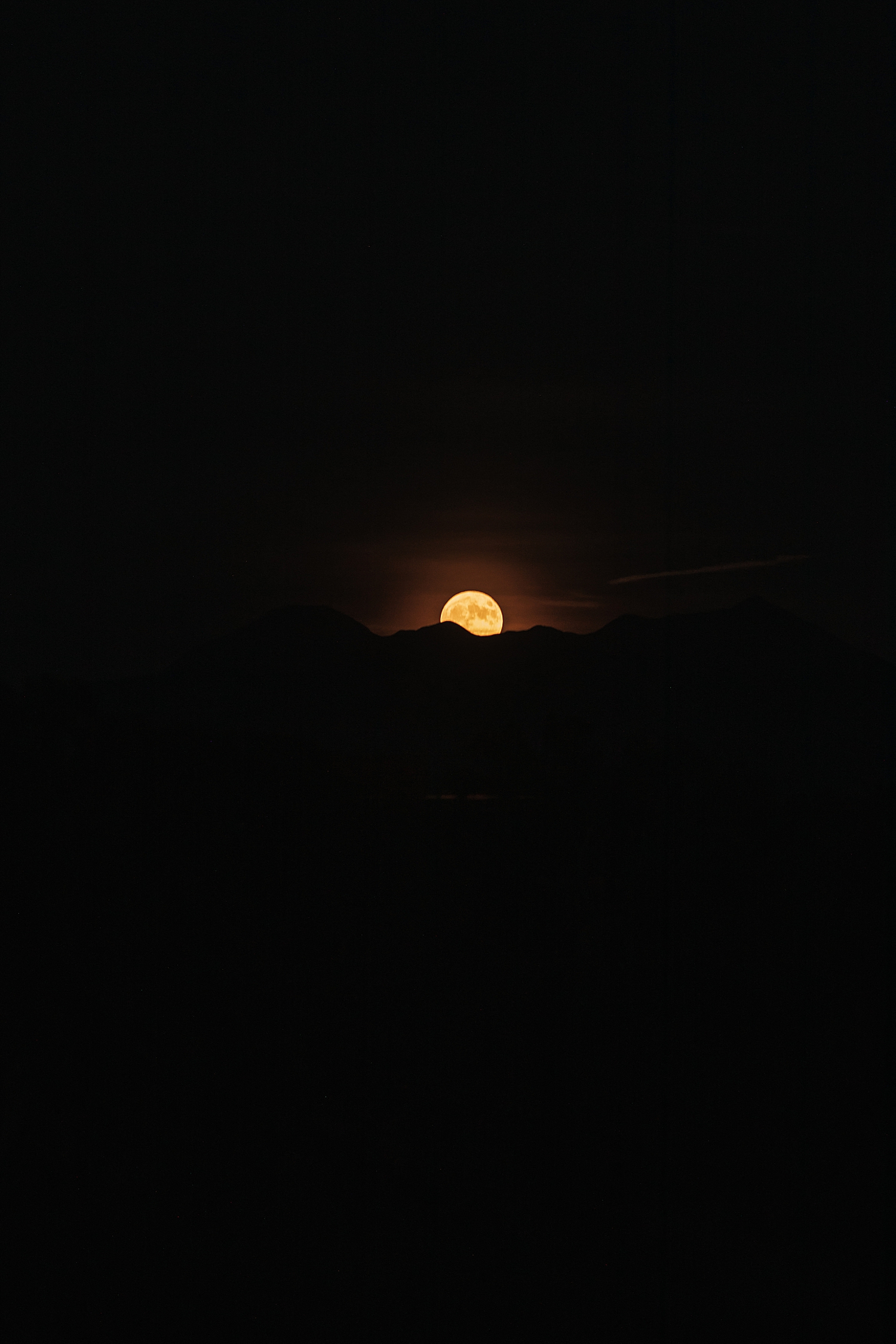 setting full moon over Dead Horse Point by Nicole Aston Photography
